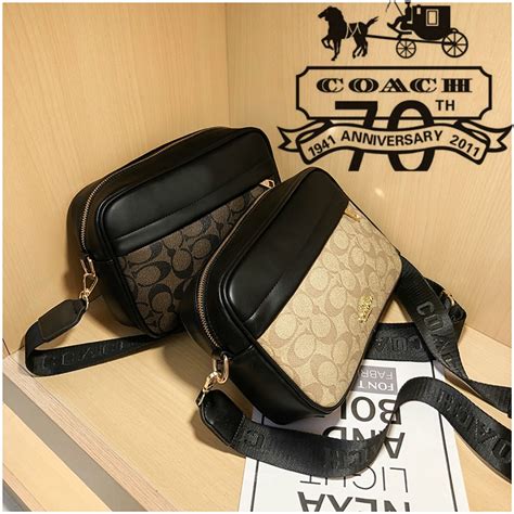 harga sling bag coach